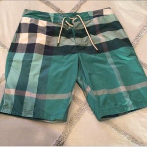Authentic Burberry men’s swim trunks, size Large